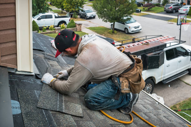 Professional Roofing technician working in Rufus, OR